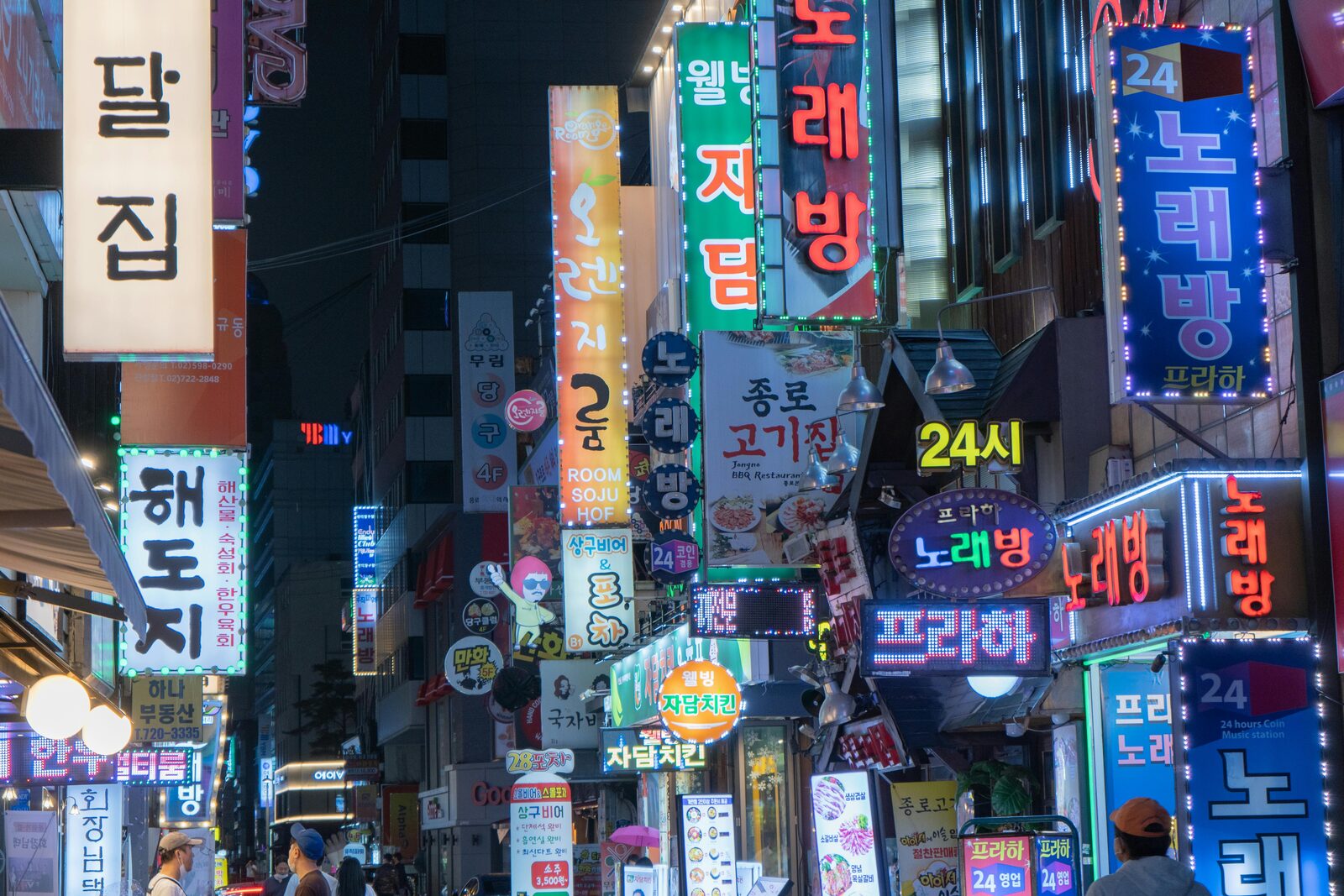 Neon-lit street at night in Seoul