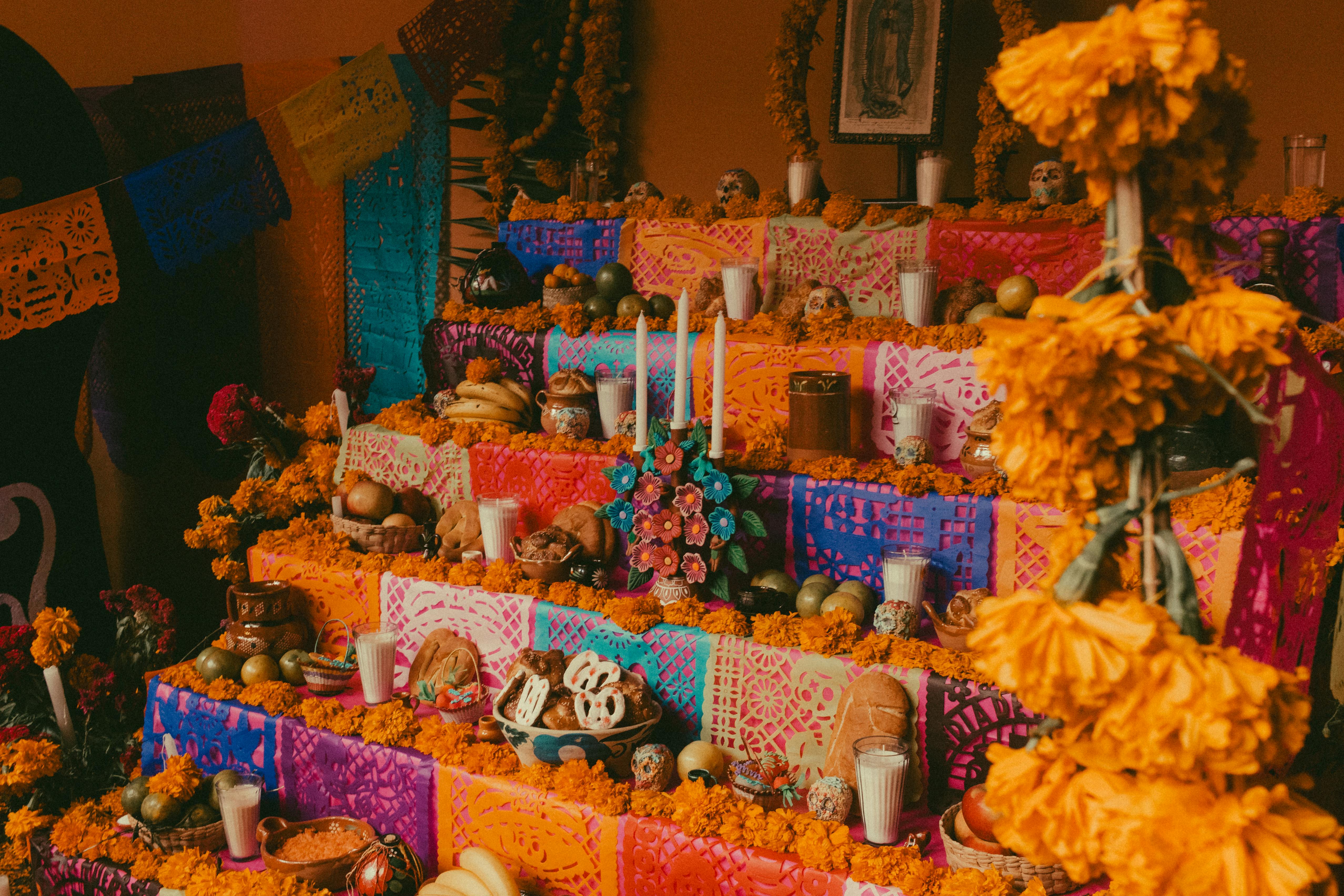 Monumental offering in the Zócalo of Mexico City with papel picado and cempasúchil