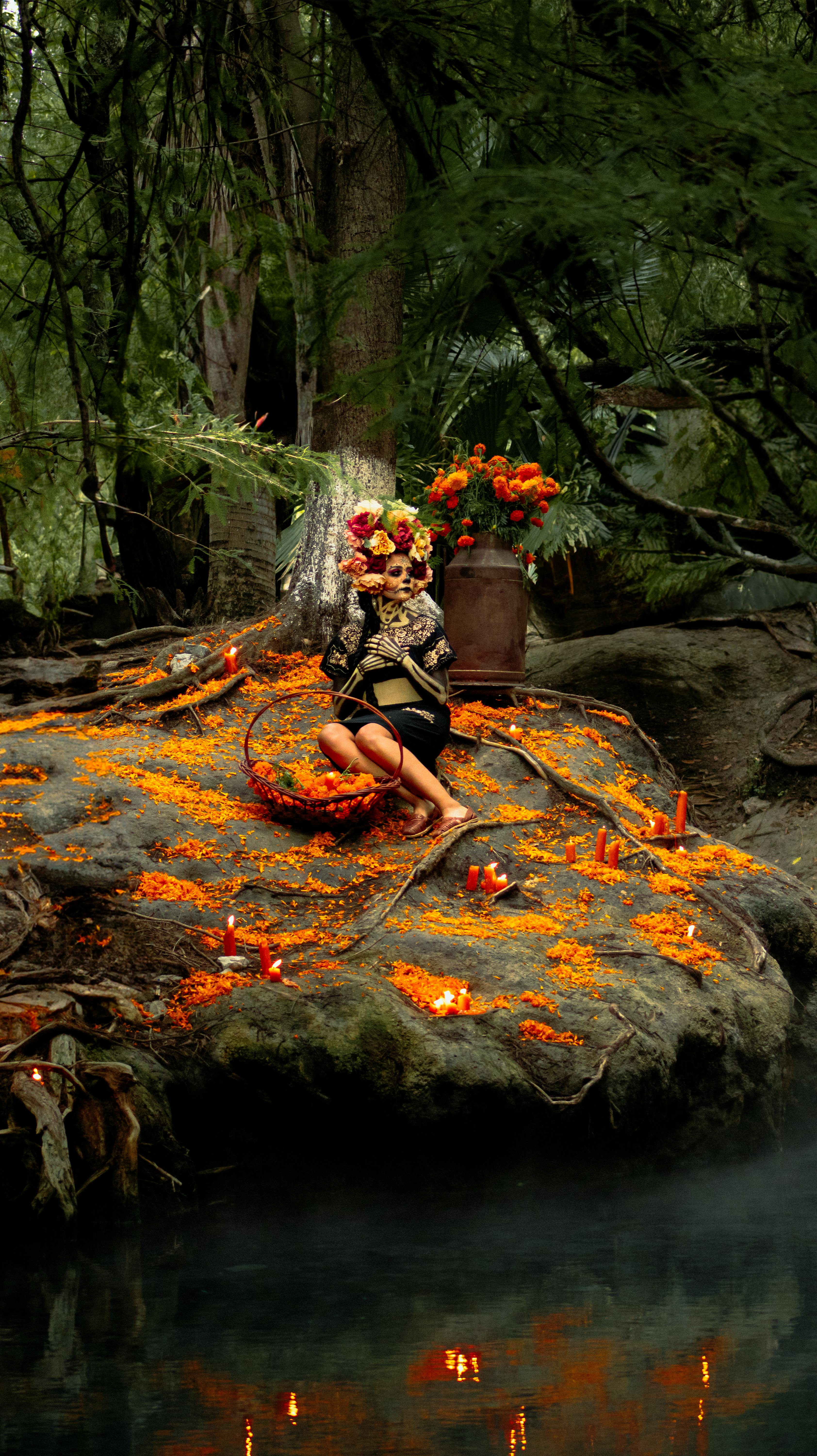Pátzcuaro and Janitzio, Michoacán, floating offering with candles among cempasúchil