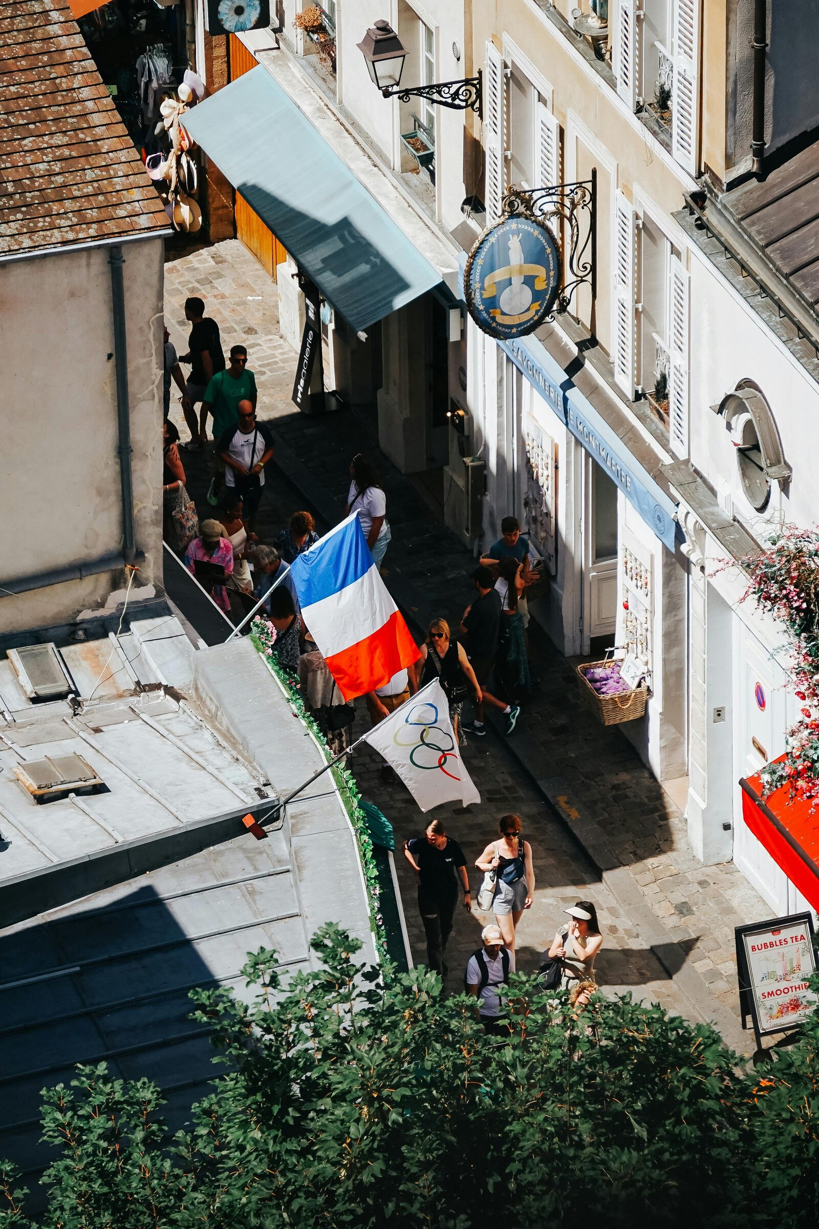 Street market in France with awnings and flags