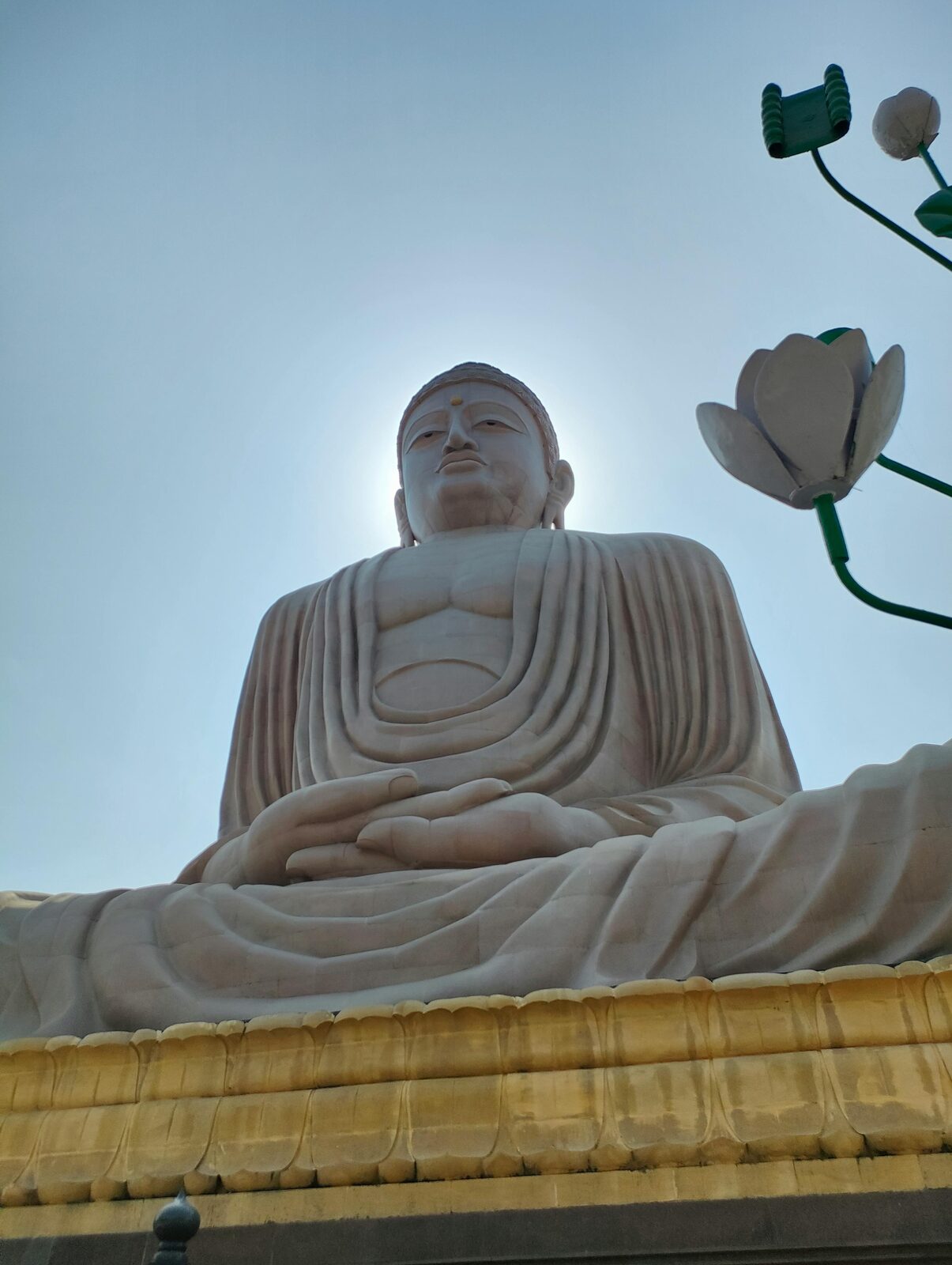 Large Buddha statue with lotus flower