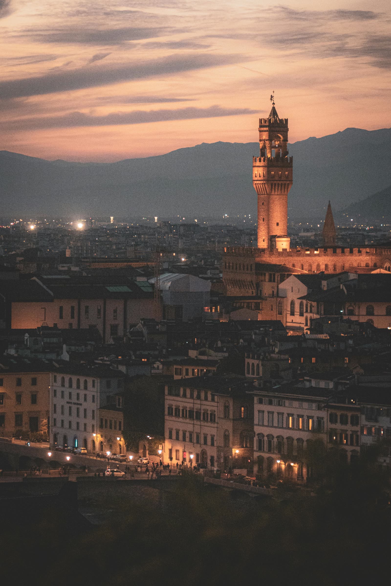 Italian towers and rooftops at nightfall