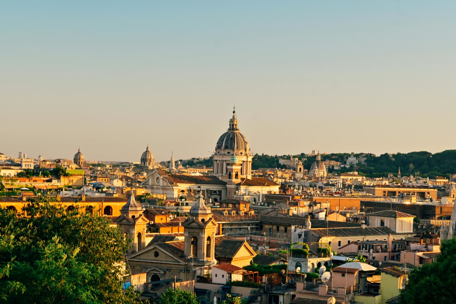 Rome's rooftops and domes at sunset