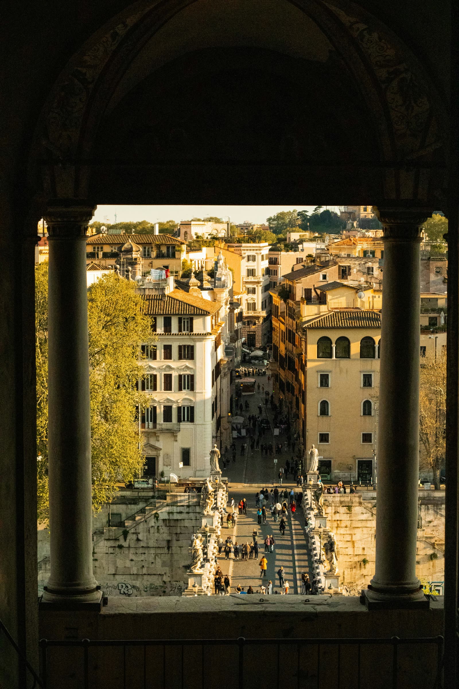 View of Rome through an arch of Castel Sant'Angelo