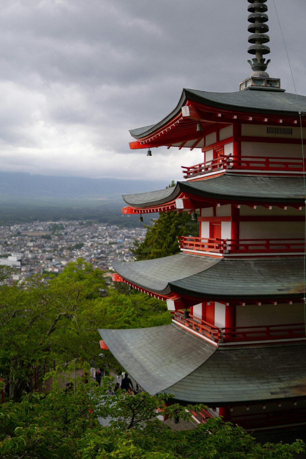 Japanese pagoda with mountains in the background, in the Japanese Alps region