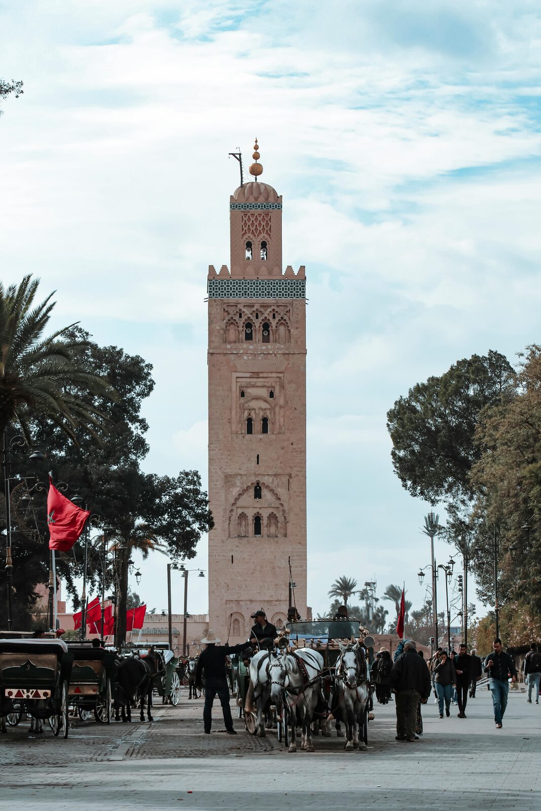 The Koutoubia minaret with Moroccan flags