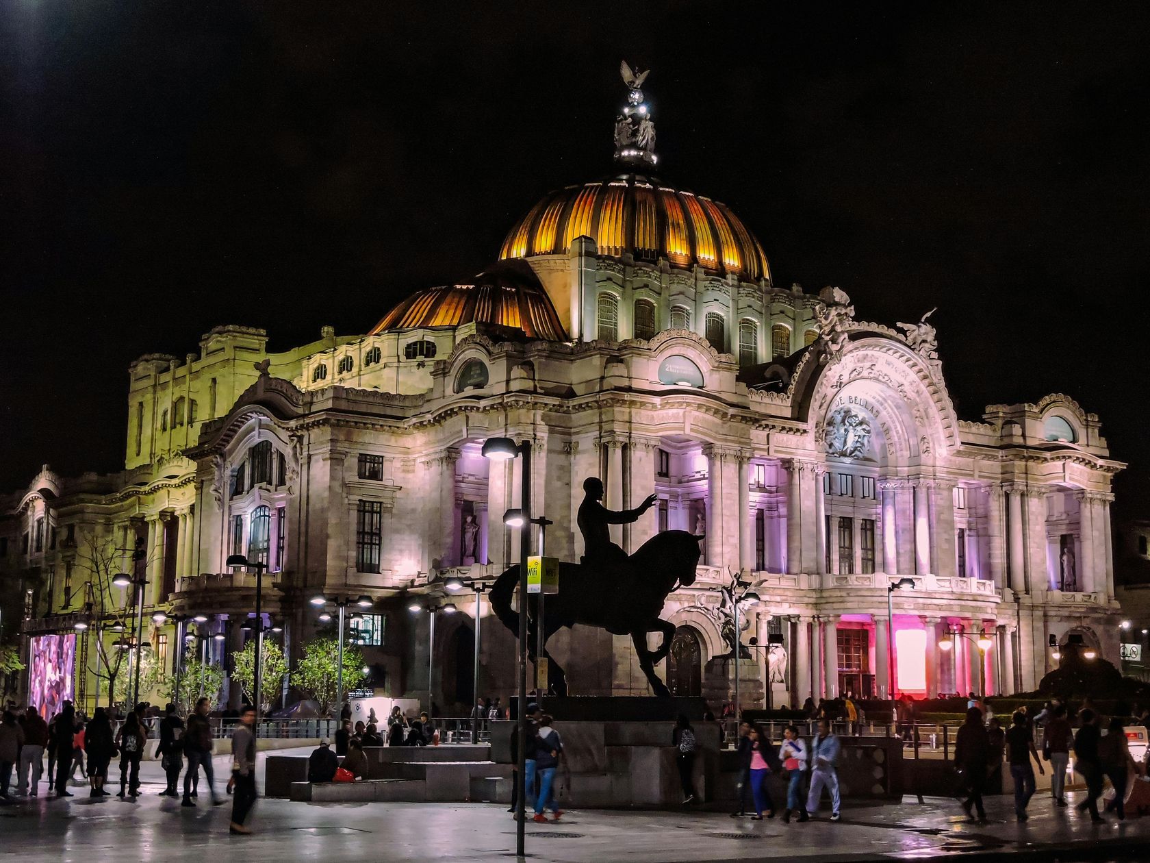 Palace of Fine Arts lit up at night in Mexico City