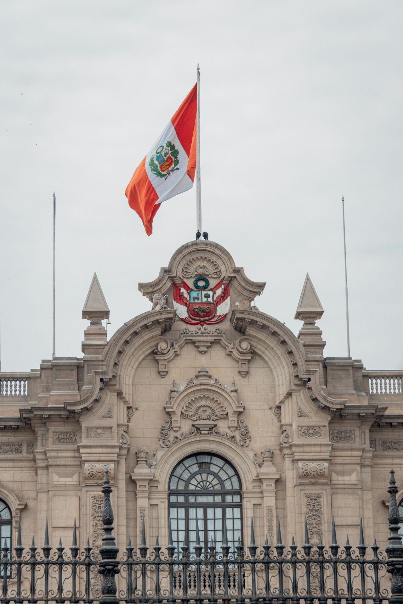 Lit colonial cathedral facade in Peru