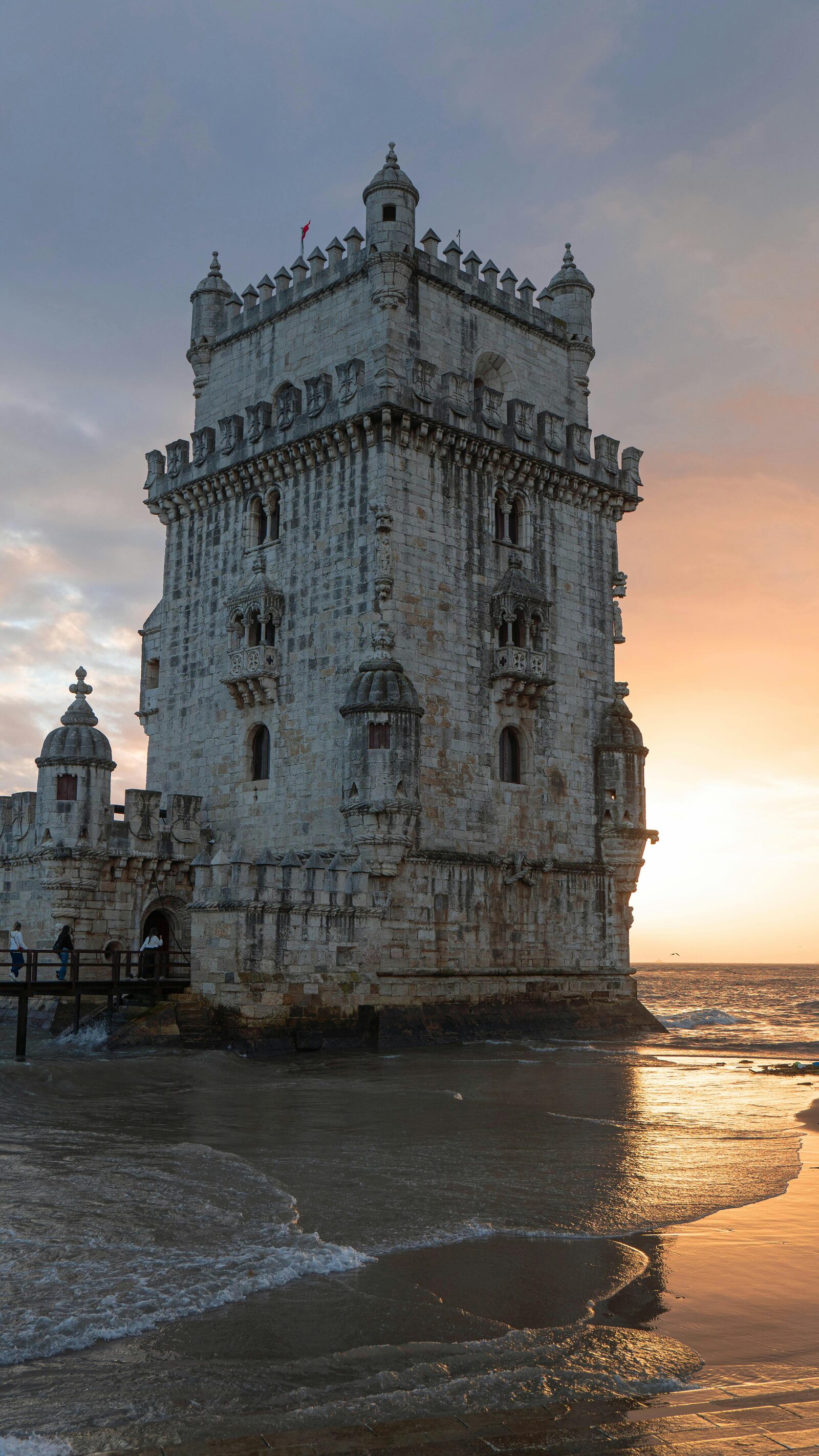 The Torre de Belém at sunset above the Tagus