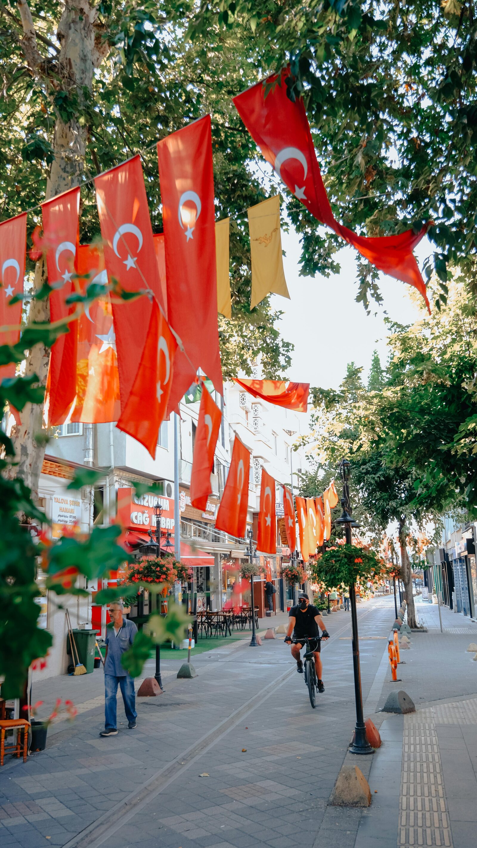 Commercial street in Istanbul covered with Turkish flags